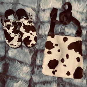 Brown cow print clogs